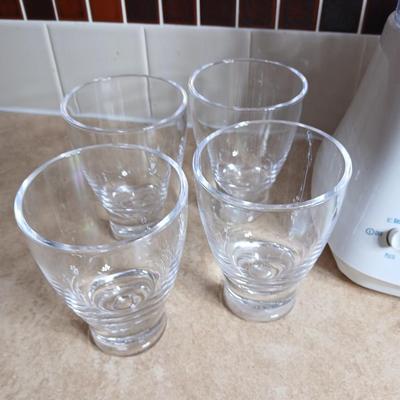 Nice Hamilton Beach 12 speed wave action blender with cups for your shakes and smoothies