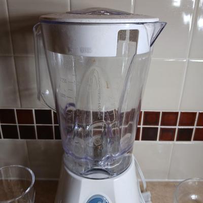 Nice Hamilton Beach 12 speed wave action blender with cups for your shakes and smoothies