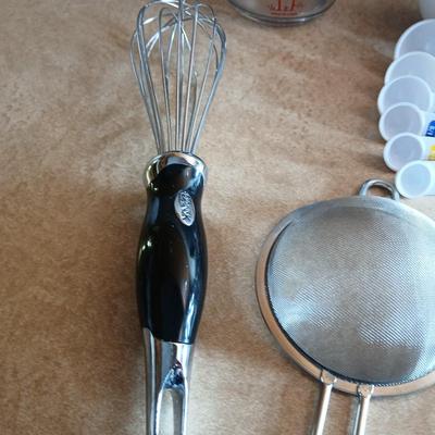 Everything you need to make cookies Except the groceries! Nice Wilton cookie sheet, utensils, and measuring tools