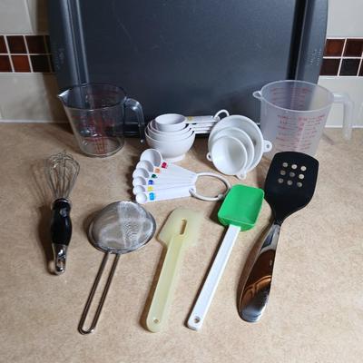 Everything you need to make cookies Except the groceries! Nice Wilton cookie sheet, utensils, and measuring tools