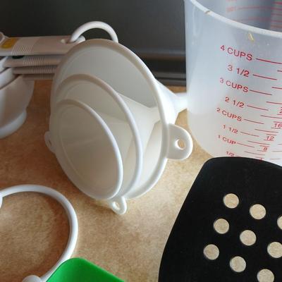 Everything you need to make cookies Except the groceries! Nice Wilton cookie sheet, utensils, and measuring tools