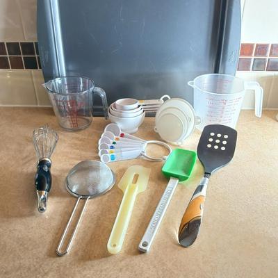 Everything you need to make cookies Except the groceries! Nice Wilton cookie sheet, utensils, and measuring tools