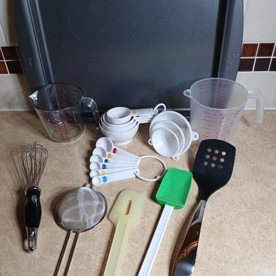 Everything you need to make cookies Except the groceries! Nice Wilton cookie sheet, utensils, and measuring tools