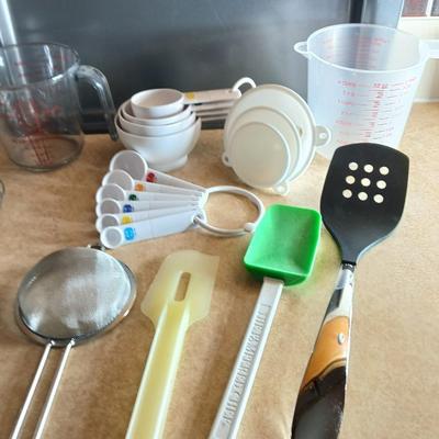 Everything you need to make cookies Except the groceries! Nice Wilton cookie sheet, utensils, and measuring tools