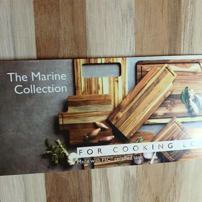 Brand new Teak cutting board with new adjustable slice knife and knife sharpener