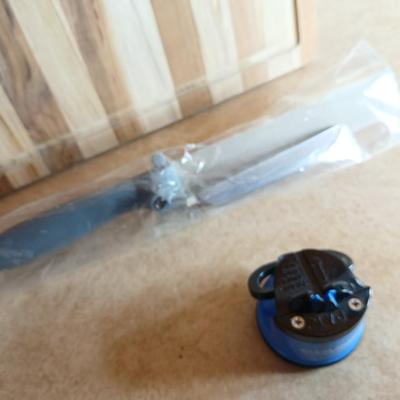 Brand new Teak cutting board with new adjustable slice knife and knife sharpener