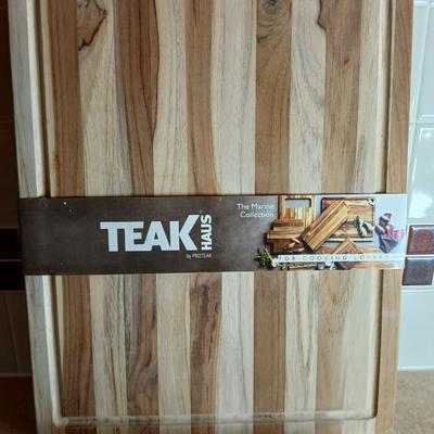 Brand new Teak cutting board with new adjustable slice knife and knife sharpener