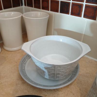 Small stoneware like Kitchen bowls and mugs with neat design
