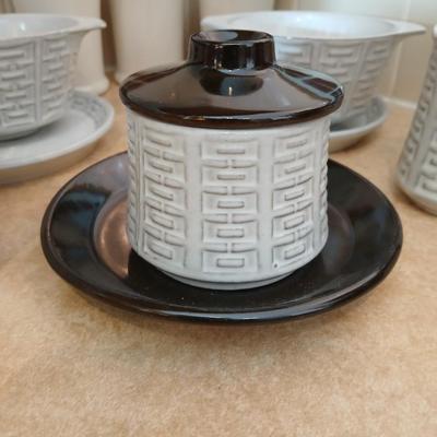 Small stoneware like Kitchen bowls and mugs with neat design