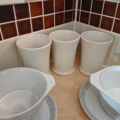 Small stoneware like Kitchen bowls and mugs with neat design