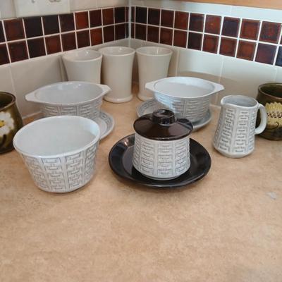 Small stoneware like Kitchen bowls and mugs with neat design