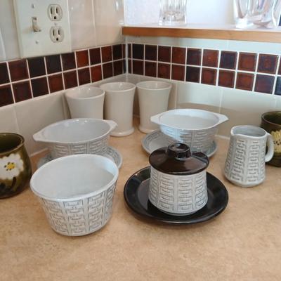 Small stoneware like Kitchen bowls and mugs with neat design