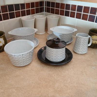 Small stoneware like Kitchen bowls and mugs with neat design