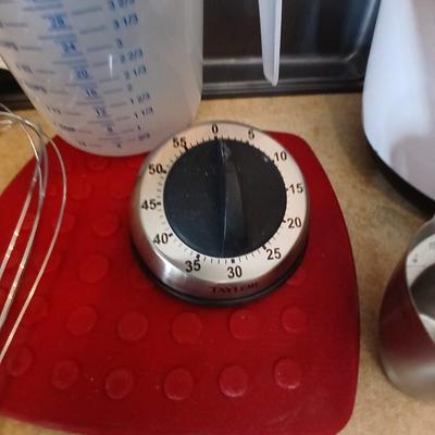 Everything you need to bake more cookies - Wilton cookie sheet and baking utensils with timer