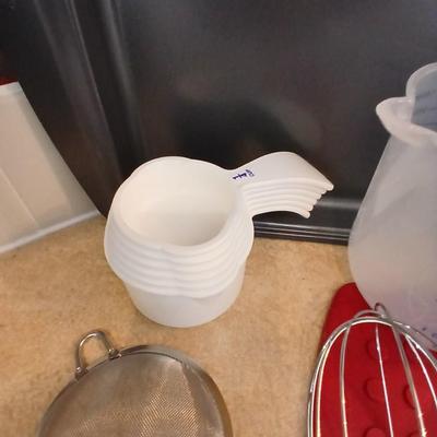 Everything you need to bake more cookies - Wilton cookie sheet and baking utensils with timer