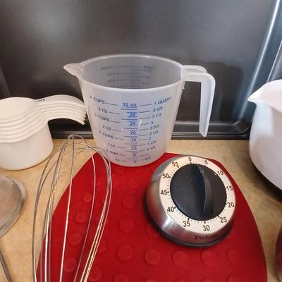 Everything you need to bake more cookies - Wilton cookie sheet and baking utensils with timer