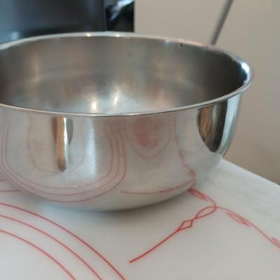 Baking items - measuring cup, Tupperware pad, small kitchen scale, rolling pin and a mixing bowl