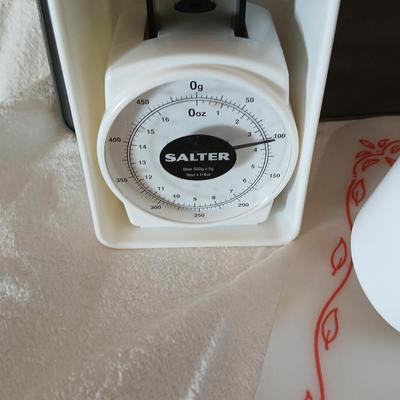 Baking items - measuring cup, Tupperware pad, small kitchen scale, rolling pin and a mixing bowl