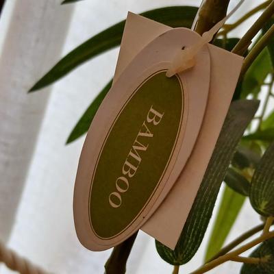 Two Faux bamboo plants in baskets - brand new with tags