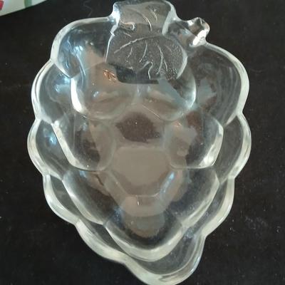 Apple pie dish, glass grape dish, apple nightlight, candles and a vase