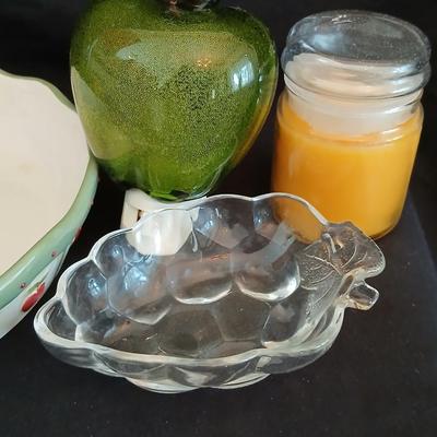 Apple pie dish, glass grape dish, apple nightlight, candles and a vase