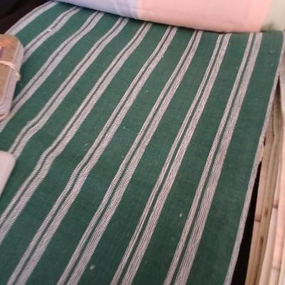 Table linens, placemats, kitchen towels, and corked back hot plate pads