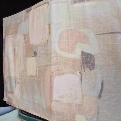Table linens, placemats, kitchen towels, and corked back hot plate pads