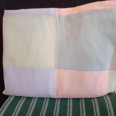 Table linens, placemats, kitchen towels, and corked back hot plate pads