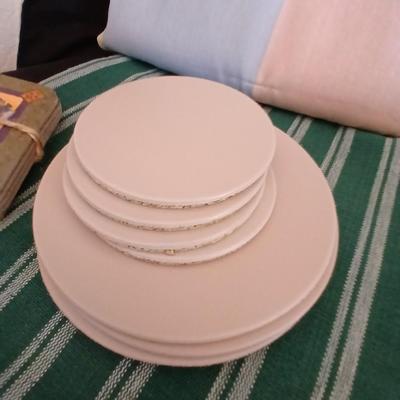 Table linens, placemats, kitchen towels, and corked back hot plate pads