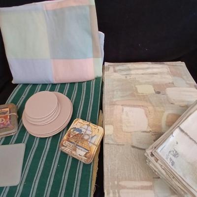 Table linens, placemats, kitchen towels, and corked back hot plate pads