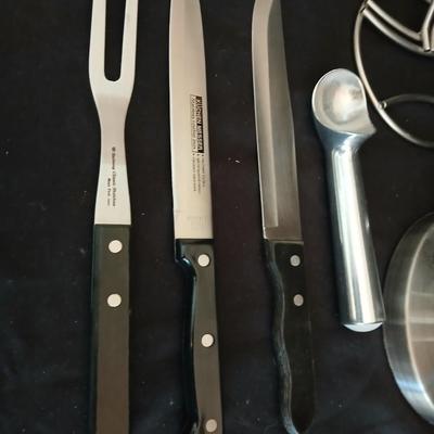 Stainless steel banana tree, paper towel rack and a few kitchen utensils