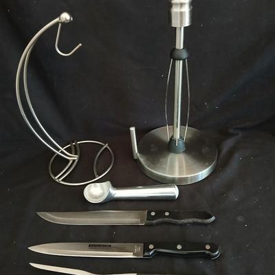 Stainless steel banana tree, paper towel rack and a few kitchen utensils