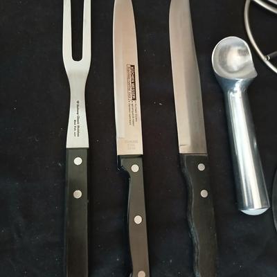 Stainless steel banana tree, paper towel rack and a few kitchen utensils