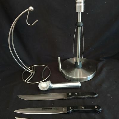 Stainless steel banana tree, paper towel rack and a few kitchen utensils