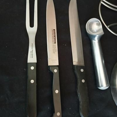 Stainless steel banana tree, paper towel rack and a few kitchen utensils