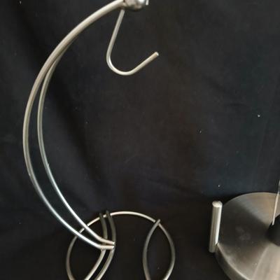 Stainless steel banana tree, paper towel rack and a few kitchen utensils