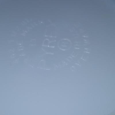 Kitchen items - placemats, small Pyrex mixing bowl, mug, napkins, kitchen towels, and more