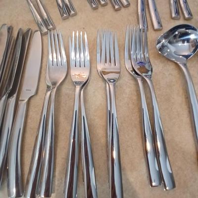 Really nice Artisan ware forged stainless flatware / silverware set with matching serving ware