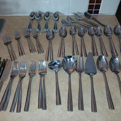 Really nice Artisan ware forged stainless flatware / silverware set with matching serving ware