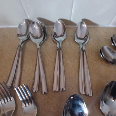 Really nice Artisan ware forged stainless flatware / silverware set with matching serving ware