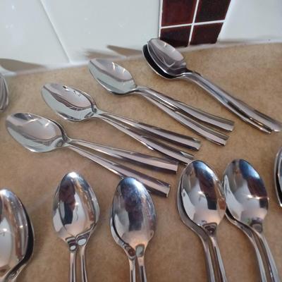 Really nice Artisan ware forged stainless flatware / silverware set with matching serving ware
