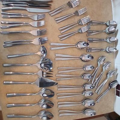 Really nice Artisan ware forged stainless flatware / silverware set with matching serving ware