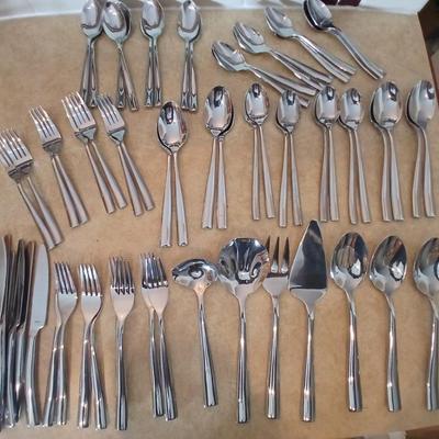 Really nice Artisan ware forged stainless flatware / silverware set with matching serving ware