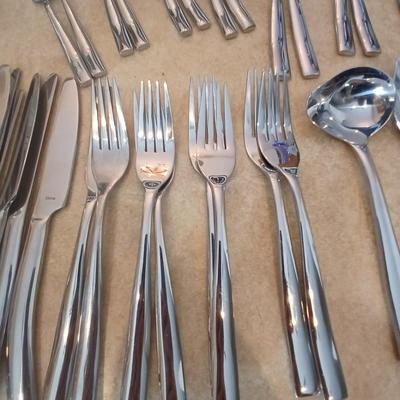 Really nice Artisan ware forged stainless flatware / silverware set with matching serving ware