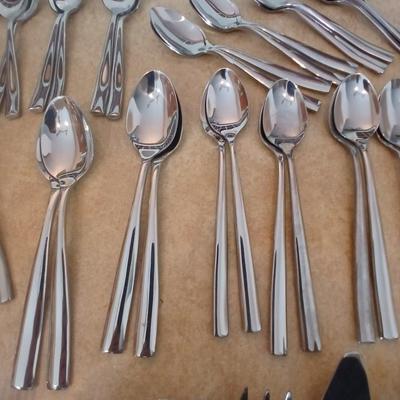 Really nice Artisan ware forged stainless flatware / silverware set with matching serving ware