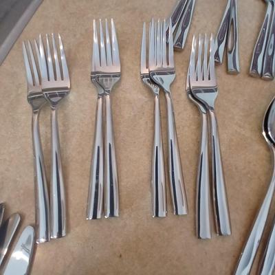 Really nice Artisan ware forged stainless flatware / silverware set with matching serving ware