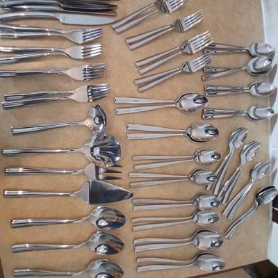Really nice Artisan ware forged stainless flatware / silverware set with matching serving ware