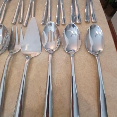 Really nice Artisan ware forged stainless flatware / silverware set with matching serving ware
