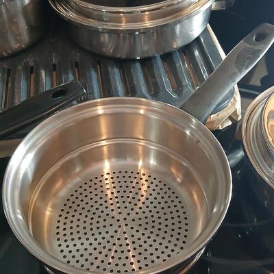 Nice stainless-steel pot and pan set with new broiler pan