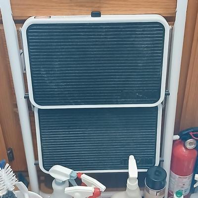 Step ladder, cleaning supplies and a fire extinguisher